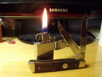 DU TRAPPER and a '75 Zippo Slim