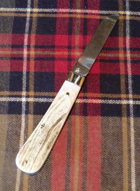 A Wright And Son Sheffield England Large Lambsfoot Knife With Stag Scales And Sheepsfoot Blade