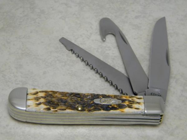 Case XX USA 2007 Amber Bone 6354GS SS Gut Hook Skinner 3 Blade Trapper Knife with Saw