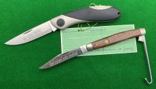  Two PUMA Folding Knives with Box and Paperwork. 