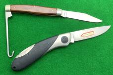  Two PUMA Folding Knives with Box and Paperwork. 