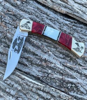 BUCK 110  BRIAN YELLOWHORSE CUSTOM VOLCANO MOTHER OF PEARL-RED GOLD ACRYLIC BRASS BOLSTERS