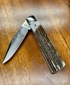 Rosecraft Savage Creek Gunstock knife with Clip Point blade and Stag covers