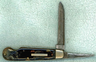 Note the misspelling in the tang stamp.