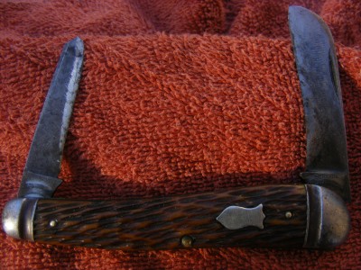 Although the blades are worn one of my favorite knives.SCHRADE CUT CO. WALDEN NY  S7303 (?)Absolutely the best looking bone handles,maybe I've ever seen.(my taste)