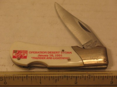 This pic is before I had time to wipe it off.There is no rust on this knife and blade and handles are mint.