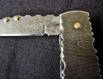 Soileau - Tang Stamp.JPG