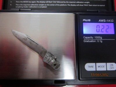 weighing in the blade, pre-grinding .22 oz