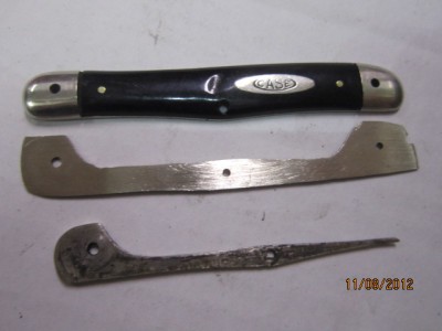 the beginnings of the new liner. this was cut from an older German corkscrew knife's liners I had laying around.