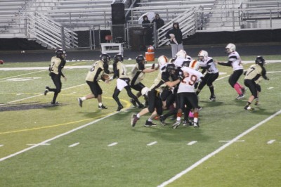You cannot see Tyler's number 62 in this picture, but he is blocking #29 of opposing team.