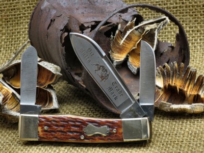 Bulldog gunstock with items found on the prairie