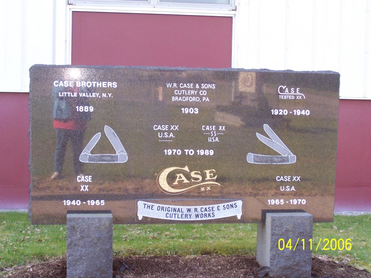 granite sign outside the case plant showing the different eras of case.