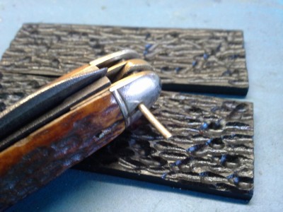 Interesting design with a small diameter nickle silver pin used to attach the bail inside of a larger diameter brass pin. Luckily I was able to almost slide out the center pin.