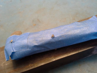 Put a lab coat over the subject for protection and clipped the pins short.