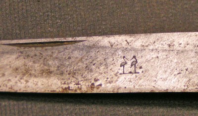 B- blade stamp of storks.jpg