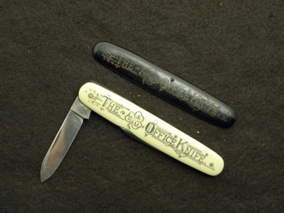 Office knife and black handle.JPG