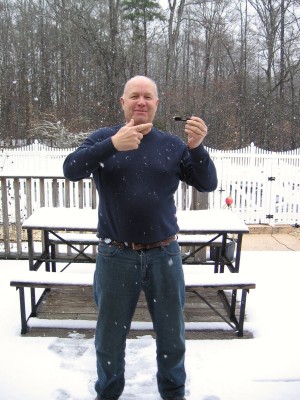 Monk in Snow with Knife.JPG
