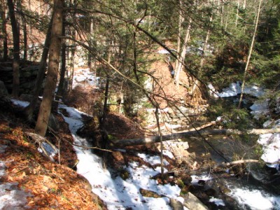 Looking way down at stream bottom. Several foundations from there up.