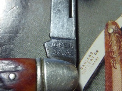 Boker USA two blade with Redbone and Jimping on spine.