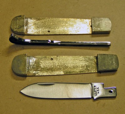 This is the spring after being polished on the inside. Shown with the blade and liners after the bolsters were soldiered on to the liners.