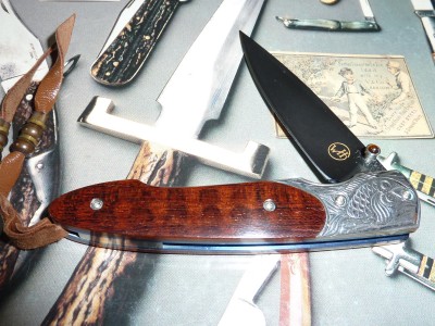 One of a kind William Henry with Snakewood handle and Sterling Silver Bolster with carved Koi Fish