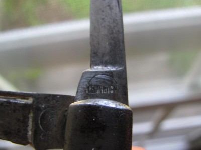 Remington mark on non-Scout blade.