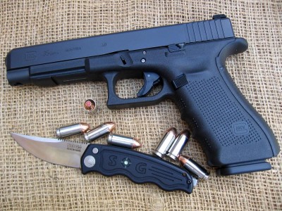 Glock 35 GEN 4  & SOG Auto.JPG