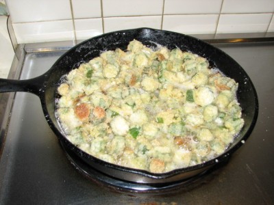 Fry in oil on medium heat until okra coating is golden brown