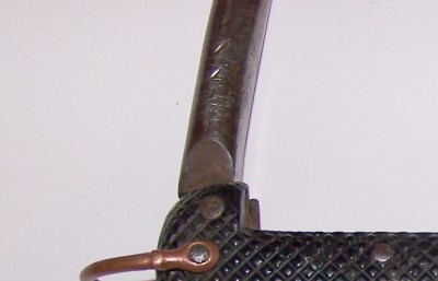 1939 bexoid grip. spike stamped with arrow (top) only left and centre part impressed. this spike has had virtually no wear, marks would rapidly disappear through heavy use