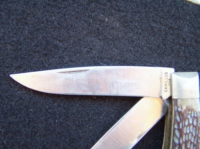 The &quot;American Wildlife&quot; print is just barely a shadow on the blade, but if you hold your mouth right, (a fave saying of my dad's), you can still read it.