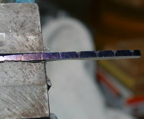 now use round needle file to make grooves as deep as half the stock and at 45 deg angle to work surface.