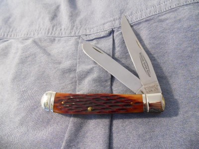 TRT-96 TENNESSEE RIVER TRAPPER WITH AMBER JIGGED BONE.jpg