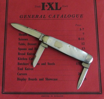 Wostenholm 3 blade pearl on cat (2).jpg
