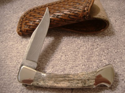 Buck 110 Damascus Mammoth Bone #2.jpg
