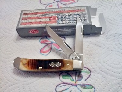 Case 2015 Mini-Trapper 6207W SS - Saw Cut Bone.jpg