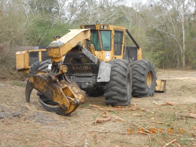 Skidder to move the wood from the tract to the loader.