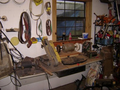 two more belt sanders. one inch on right and a kalamazoo that i put a treadmill variable speed motor on. I took the control panel and put it beside the grinder. Punch in whatever speed you want. Motor with buffing wheel and wire brush.