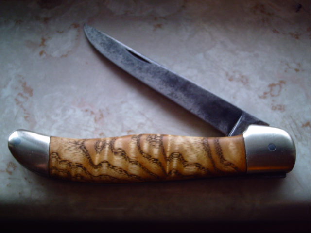 This is a case folkding hunter that I bought at a flea market, someone had switched the blade out before I bought it, no tang stamp as usual with the narrow case FH blades, I believe it is tested, not positive, but it is not similar to any XX or '70's'mod