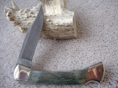 Buck 110 Damascus Camel Bone #5.jpg