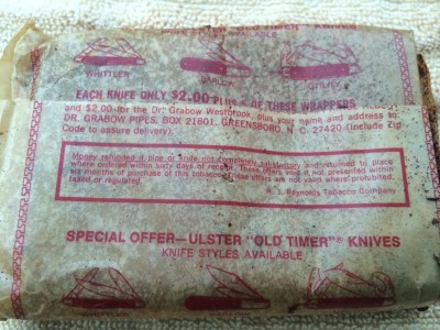 The wax paper tin liner from a pocket sized Prince Albert tin.