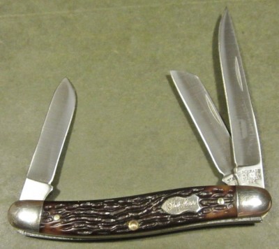 I had a brain fart and missed this one. Haven't had a chance at one since. :-(  Schrade, Ny., 4 line stamp.