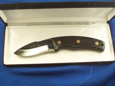 Schrade Ducks Drop Point TEFLON coated.jpg