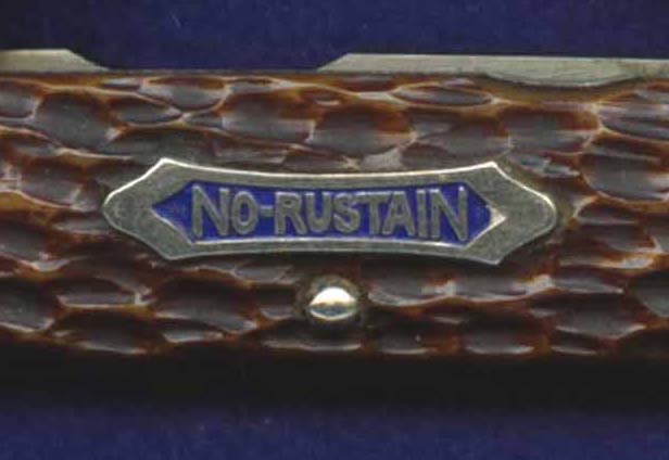 Robeson's early, pre-WWII, stainless pocketknives were shielded and etched as, "No-Rustain". The shield had a blue background.