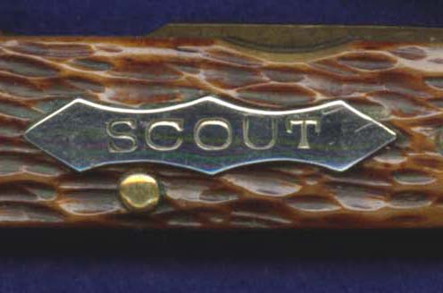 Scout shield used on some four blade scout-utility knives.