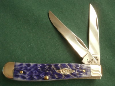 2005 Case 6207W Ultraviolet Jigged Bone Wharncliffe Mini Trapper