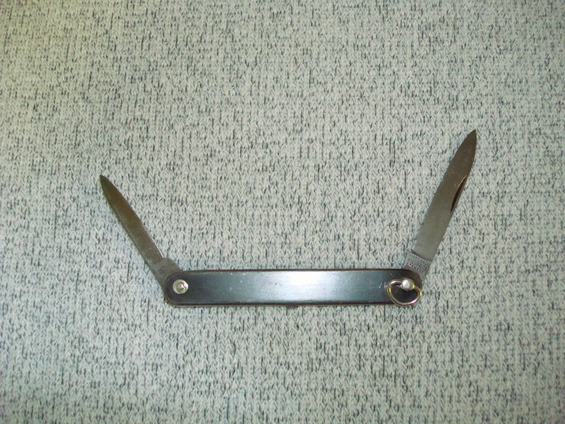 This is a small gentleman's knife.  To open either of the blades, lift and turn the small rings in the pivot pin.  These are not that rare, but finding one in good condition is hard.  Marked "Marshall Field &amp; Co.  Germany."