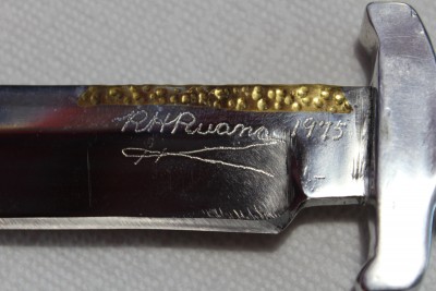 RH Ruana used hard for years, not much collector value left.JPG