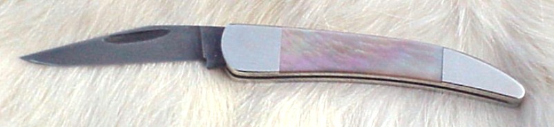 1/16" Twist Stainless Damascus - Flat Grind, Nickle Silver Integeral Bolsters &amp; Liners. Handle Material: Premium Brown Lip Pearl.