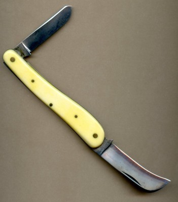Schrade Cut shadow French ivory240.jpg