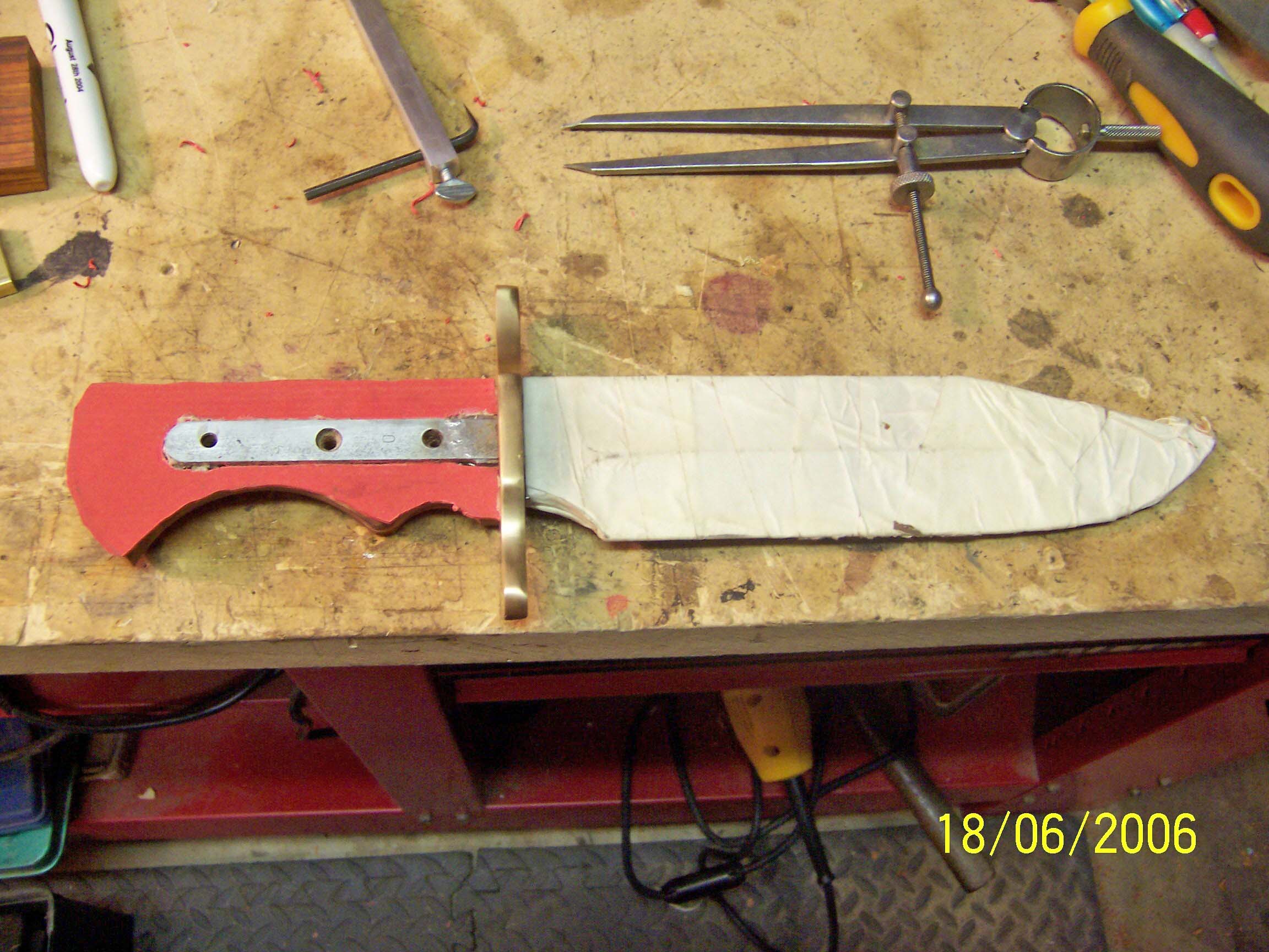Here I am sitting the space or material between the two halves of the handle.  This step is probably not necessary but I think it adds just a little bit to the completed knife.  After this step I glued the two halves of the handle together and begin sandi